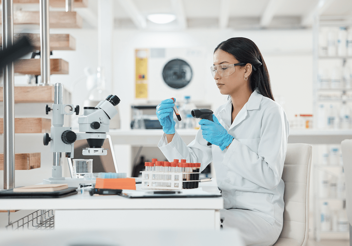 Scientist analyzing samples in a laboratory.